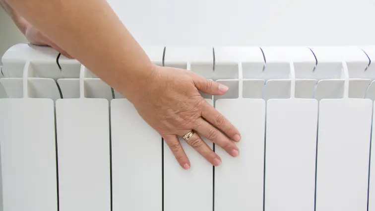 touching cold spot on radiator e1635687196191 edited