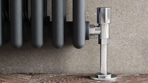 elegant traditional anthracite vertical victorian column radiator closeup valves edited