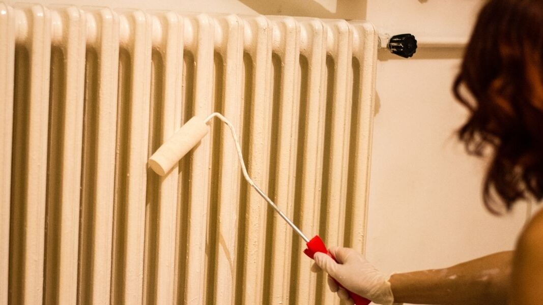 painting a radiator with a roller edited
